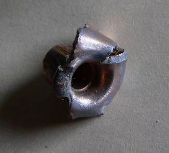 Hornady 458 480 gr base jacket recovered at 9" mark.png