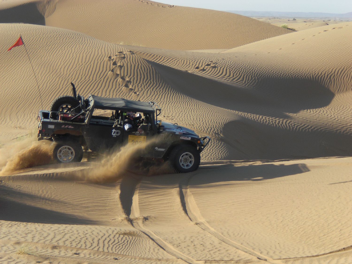 hummer in dunes.JPG