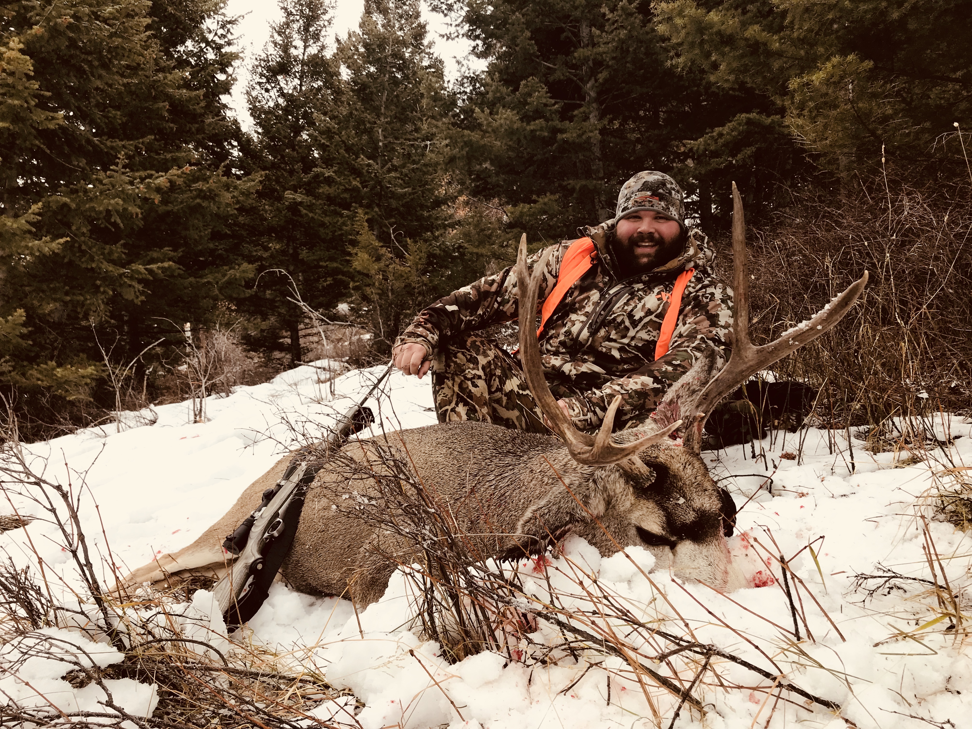 Jordan with 5x3 mule deer.jpg