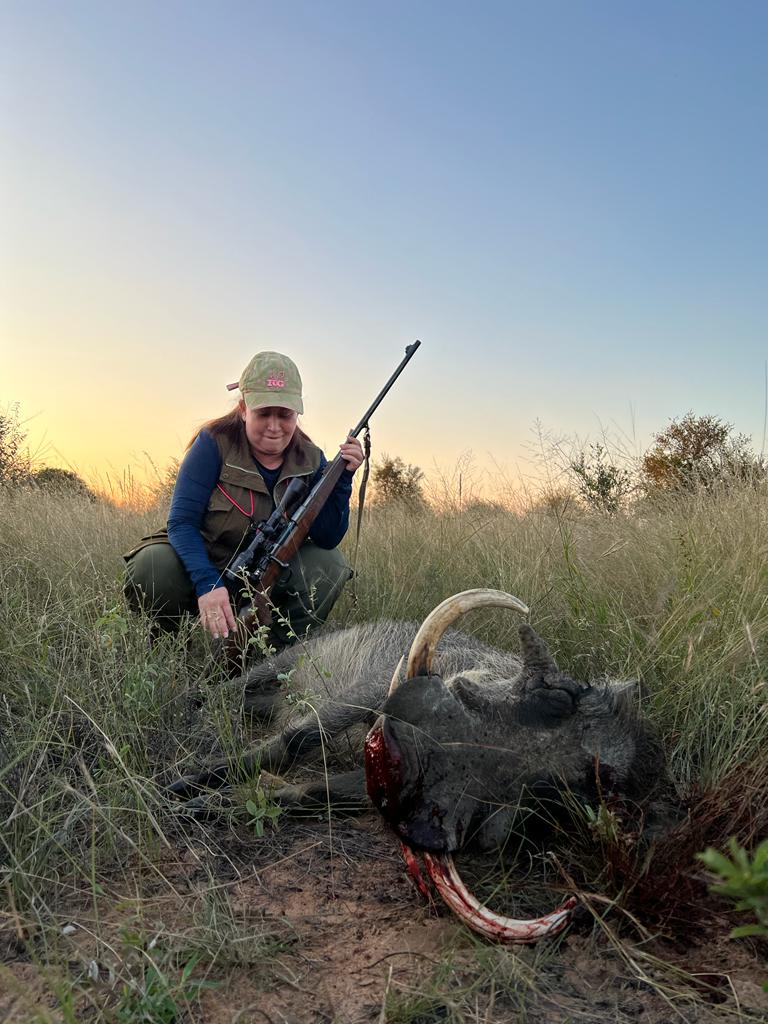 mama giving thanks for warthog.JPG