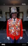 odwell-the-famous-doorman-at-the-victoria-falls-hotel-displays-his-A6KH74.jpg