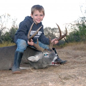 My six year old sons first buck