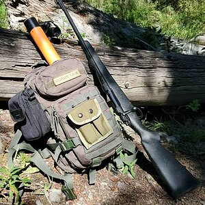 Backpack With .458 Caliber Rifle Cartridge