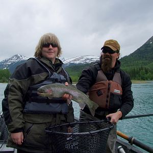 My son with the biggest rainbow of the day on the Kenai River