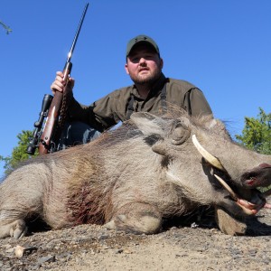 Warthog with my PH Lance Charles with Russ Field Safaris