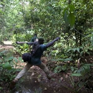 Guy leaping stream...