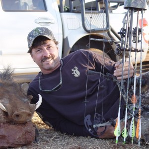 My first warthog with a bow. Limcroma Safaris 2009