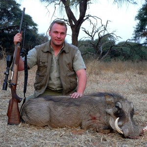 12"Warthog taken near Grootfontein, Namibia, by Charl Kemp