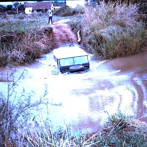 Crossing the Chosi river to or from the farm.