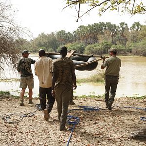 Raft is carried to the water