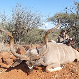 Young huntress and fine Bull