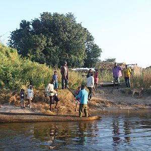 Dugout canoes & netters selling bait