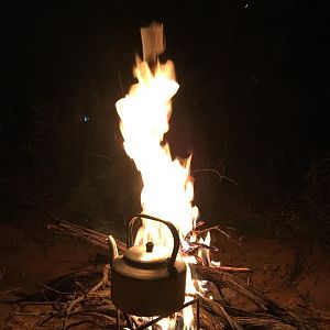 Preparing drinks on the fire