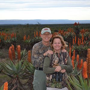 My wife and I in a field of aloe