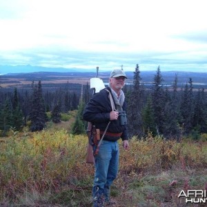 My father modeling an Oberndorf Mauser Toilet Paper Dispenser in 9.3x62