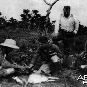 Theodore Roosevelt, skinning an antilope