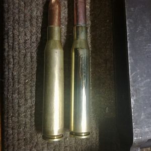 91 mm round alongside a 87 mm round..dummies both of them..