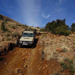 Driving to an untouched paleolithic site featuring rare rock paintings