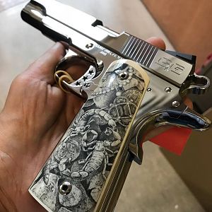 Scrimshaw Art on grips of Cabot Guns