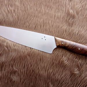 A 7 1/2 Inch Chef Knife in 12C27 with select Walnut