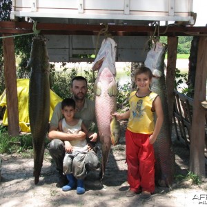 Me and my children after a fishing trip in the river Araguia, Brazil