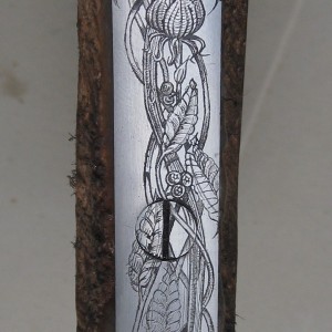 Engraved long trigger guard