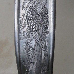 Engraved long trigger guard