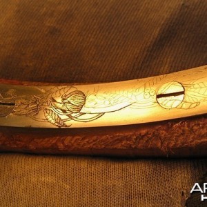 Engraved long trigger guard