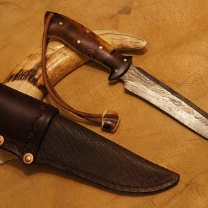 Knife & Sheath made out of Cape Buffalo Leather