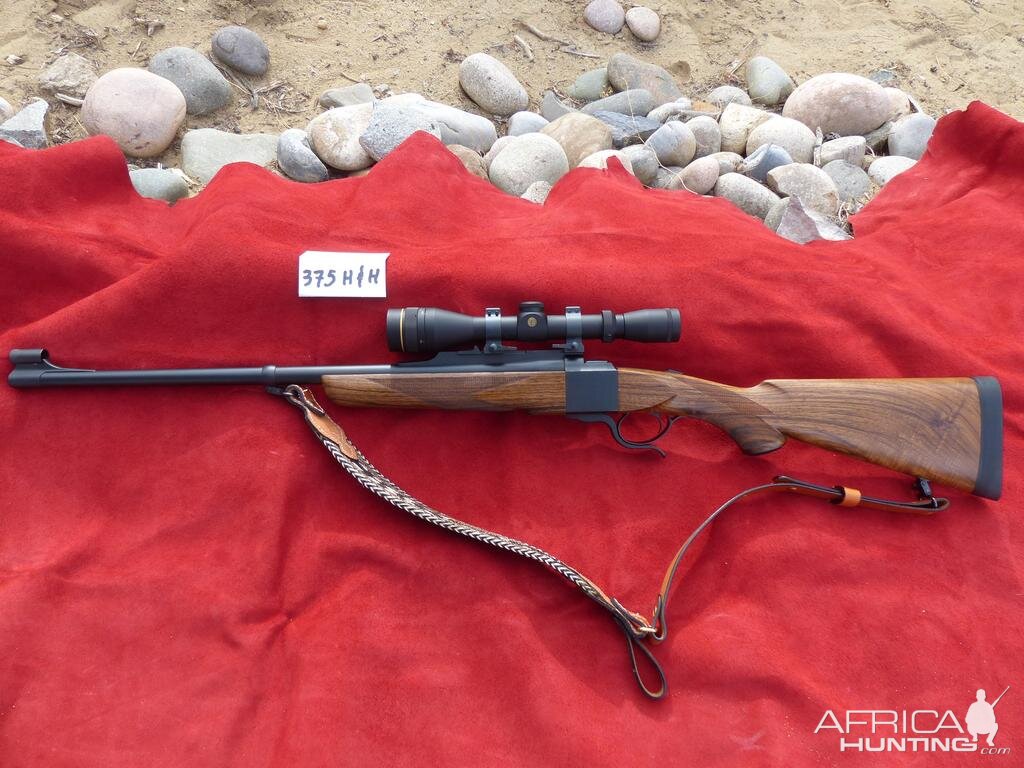 375 H&H Dakota Model 10 Rifle with Express sights, Leupold VX2 3x9x40 in Talley rings