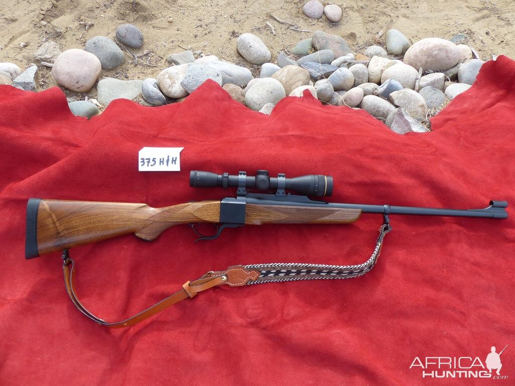 375 H&H Dakota Model 10 Rifle with Express sights, Leupold VX2 3x9x40 in Talley rings