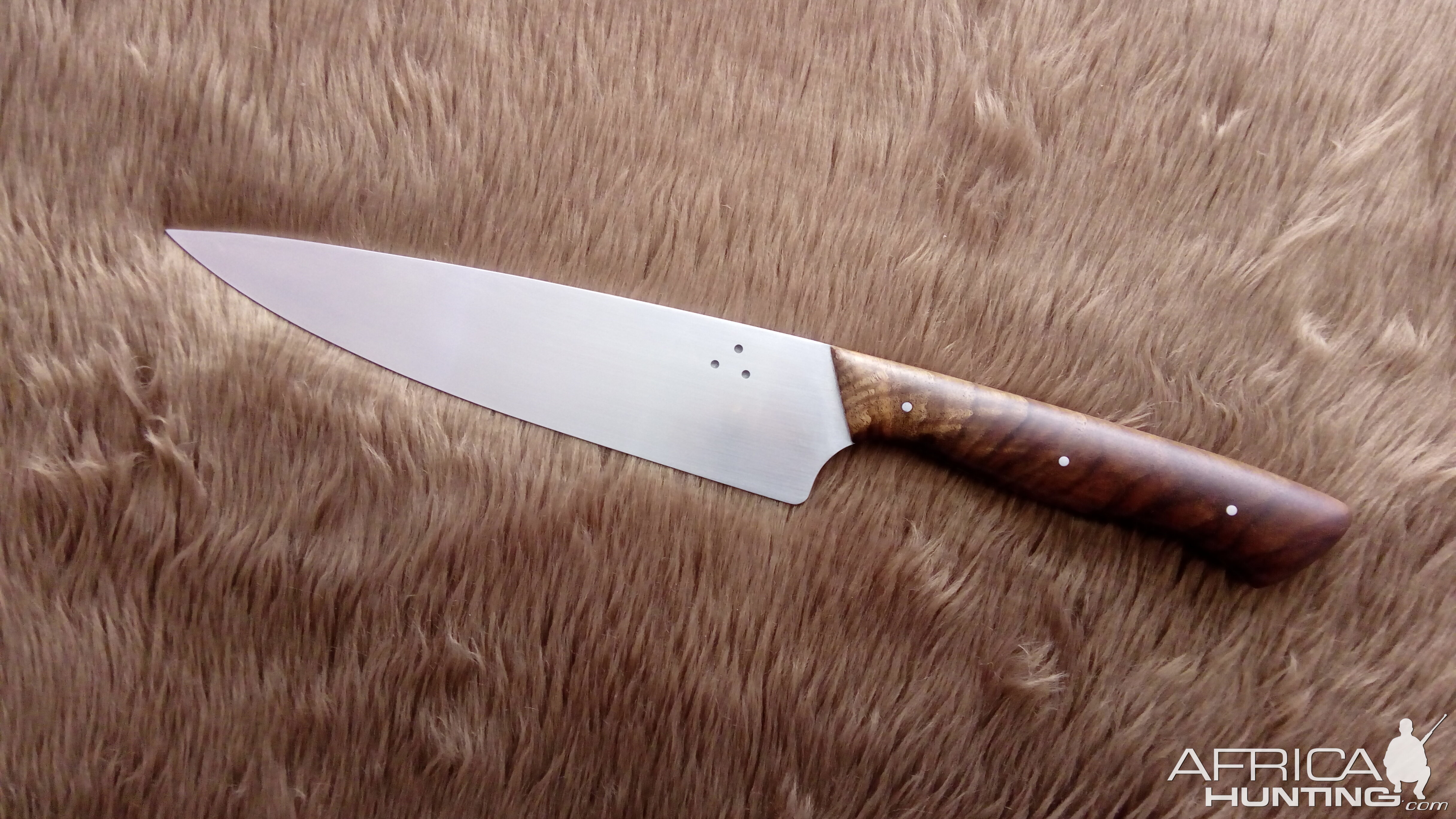 A 7 1/2 Inch Chef Knife in 12C27 with select Walnut