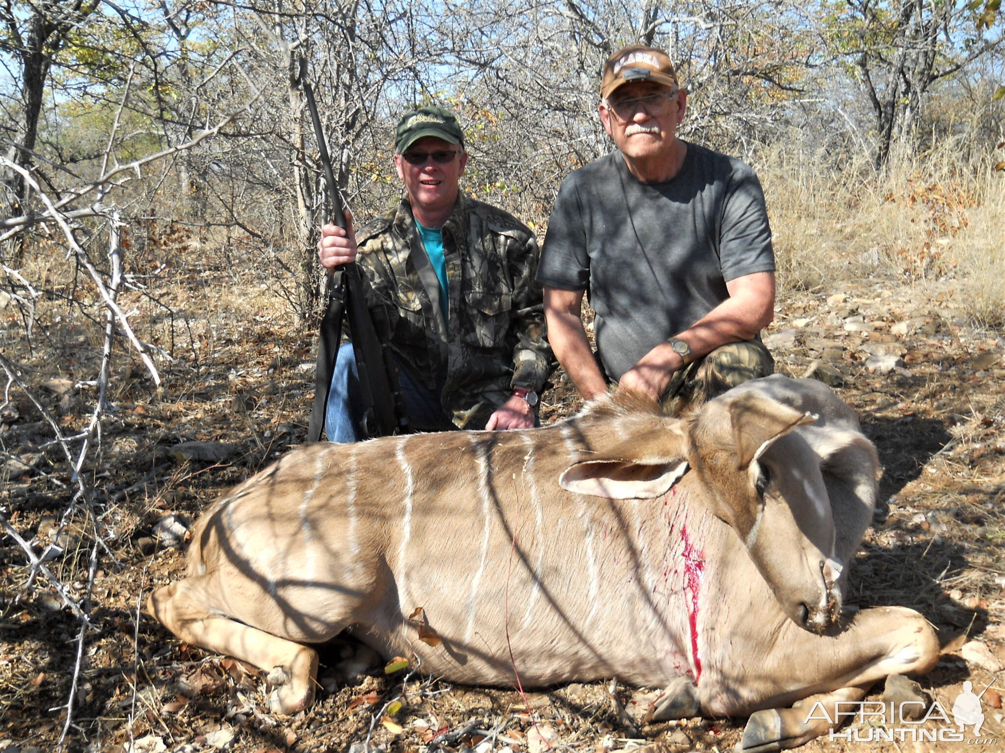 a friend and i with his kudu cow