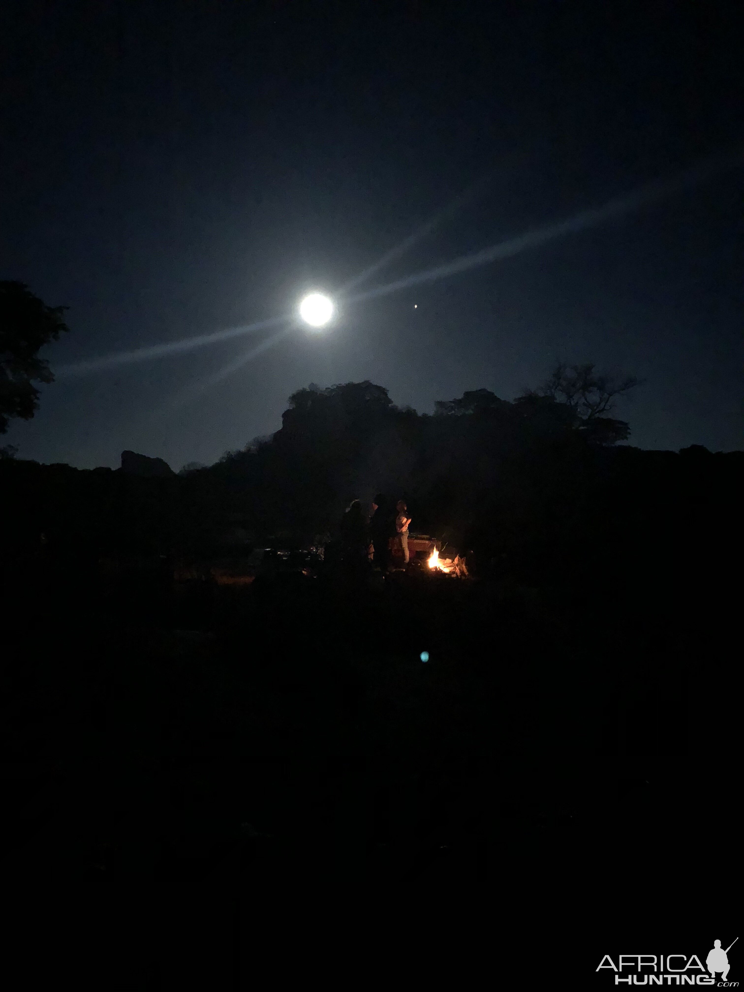 A shot of the moon and Mars rising