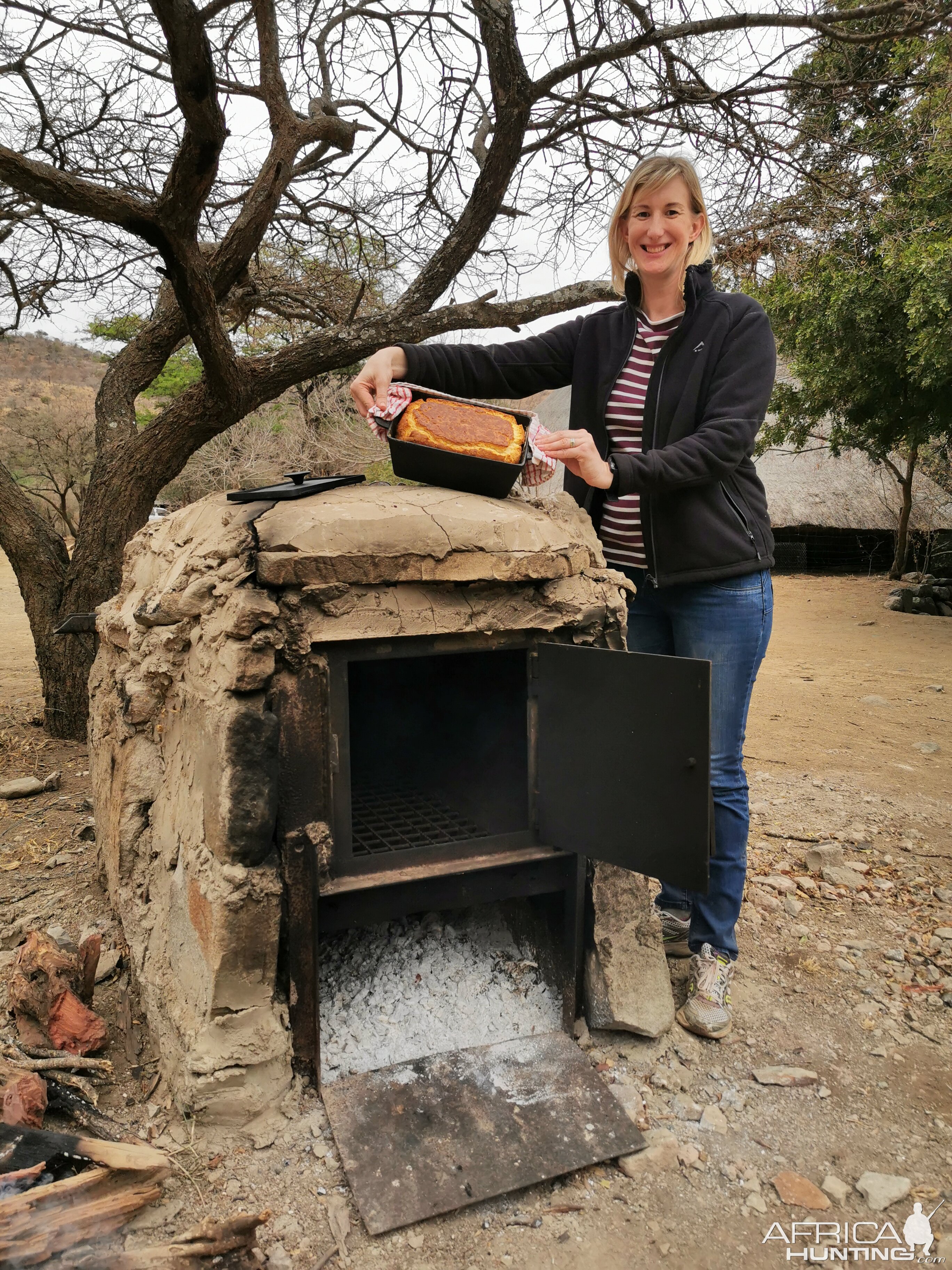 Baking fresh bread in a wood fired oven