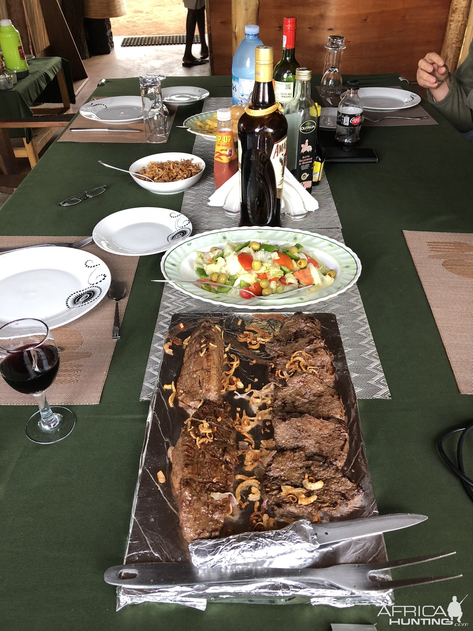 Buffalo Steak Milanese with potatoes and steamed vegetables