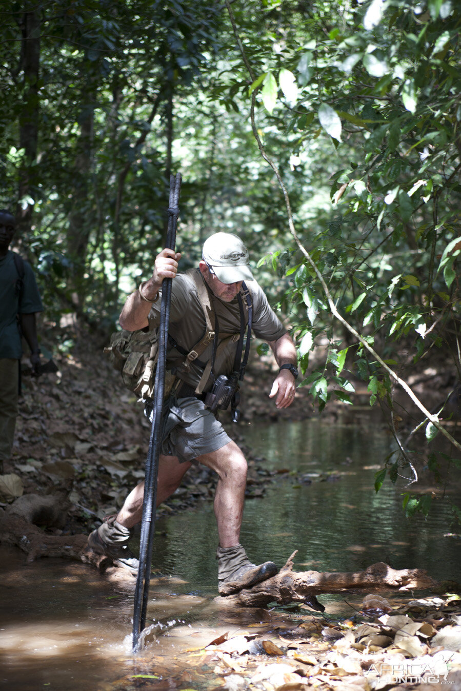 Cameron leaping stream...