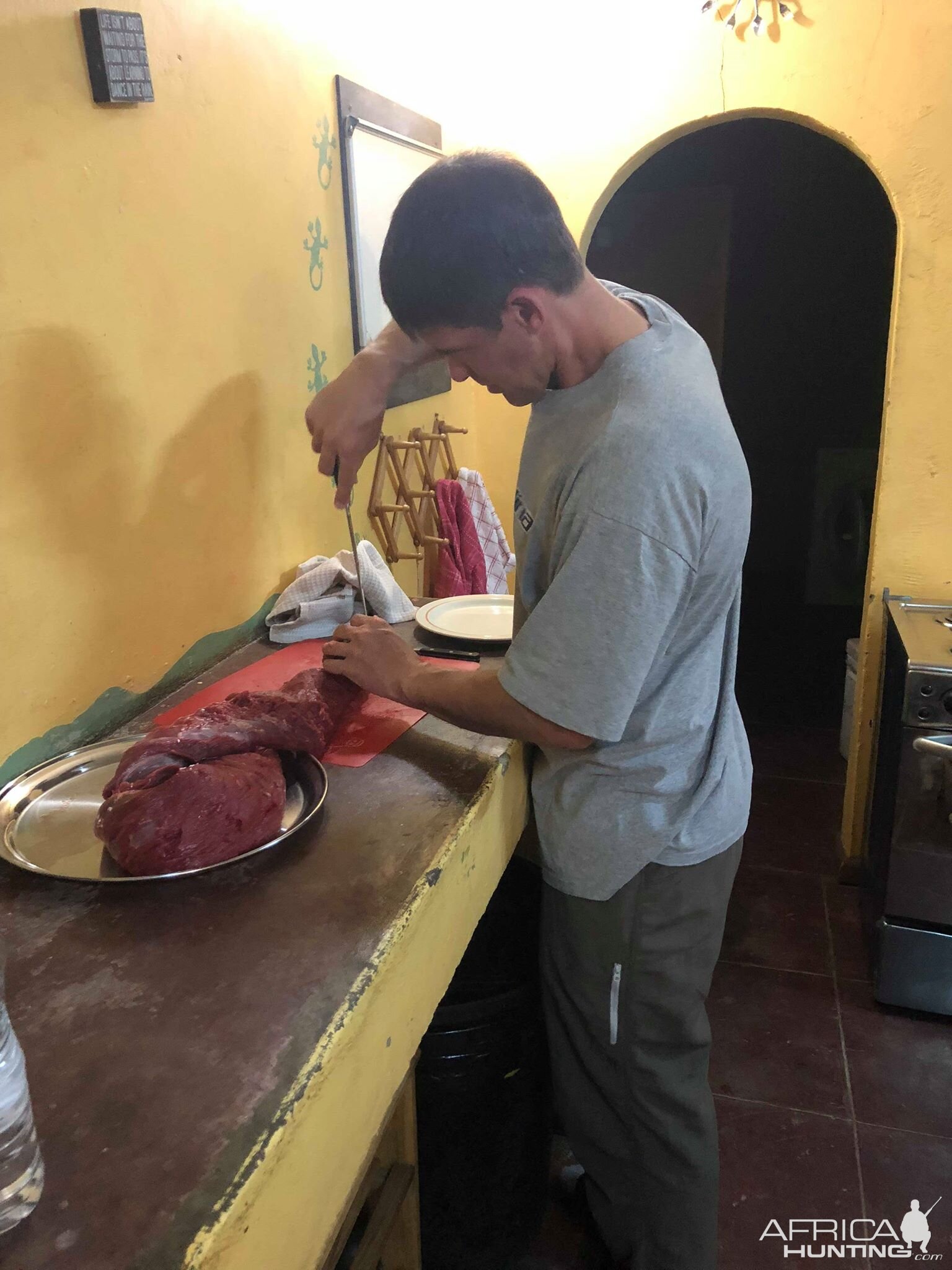 Charles cutting up some steaks