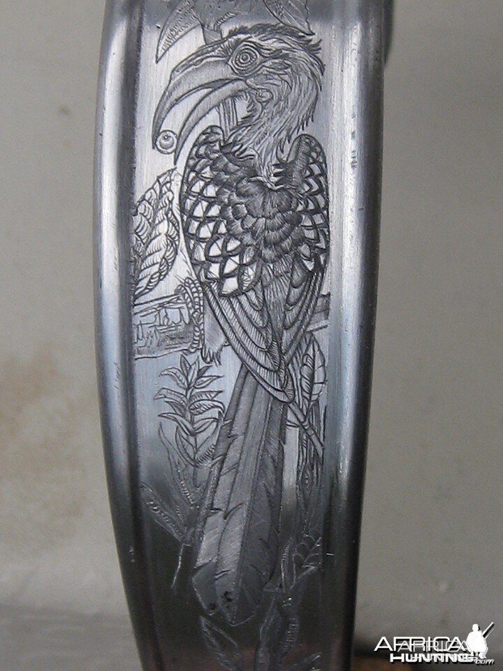 Engraved long trigger guard