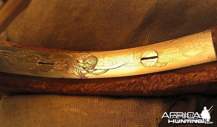 Engraved long trigger guard