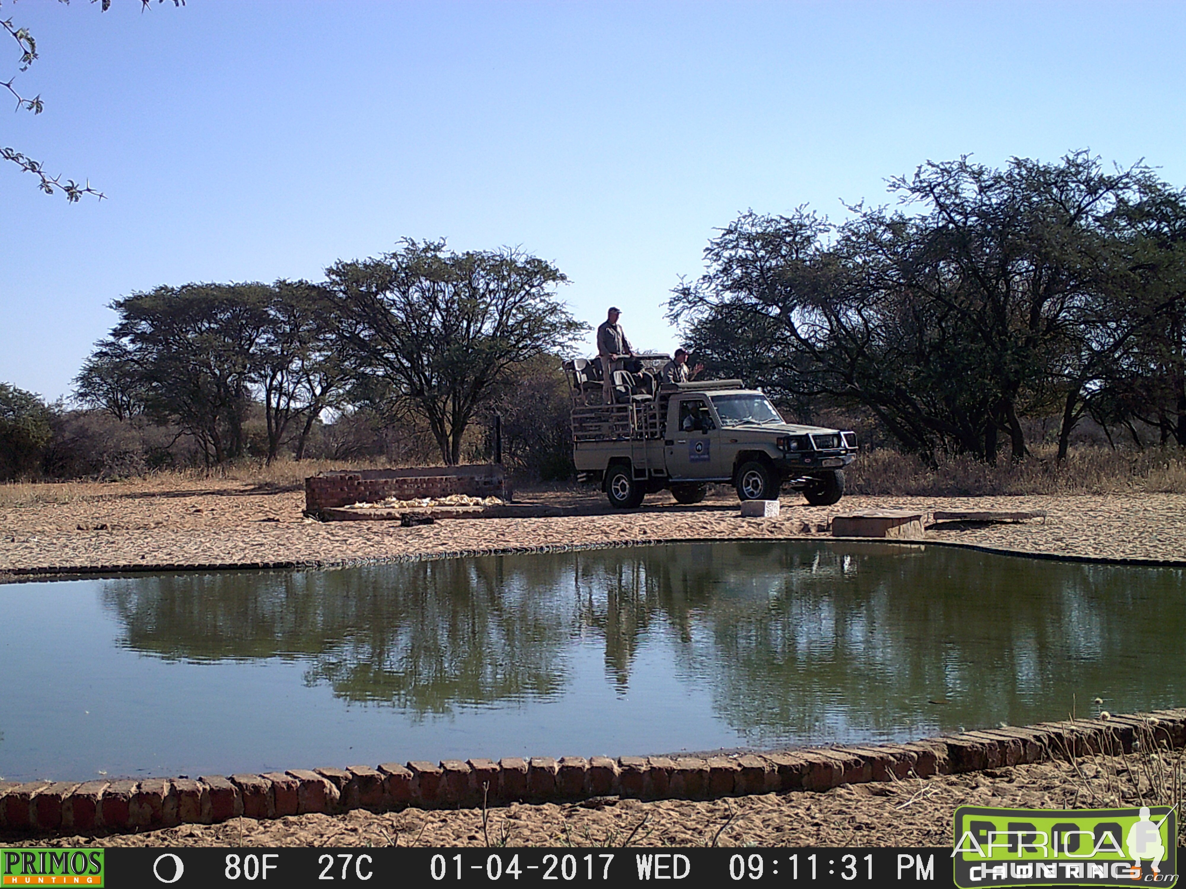 Hunting Vehicle at Waterhole Trail Cam Pictures South Africa