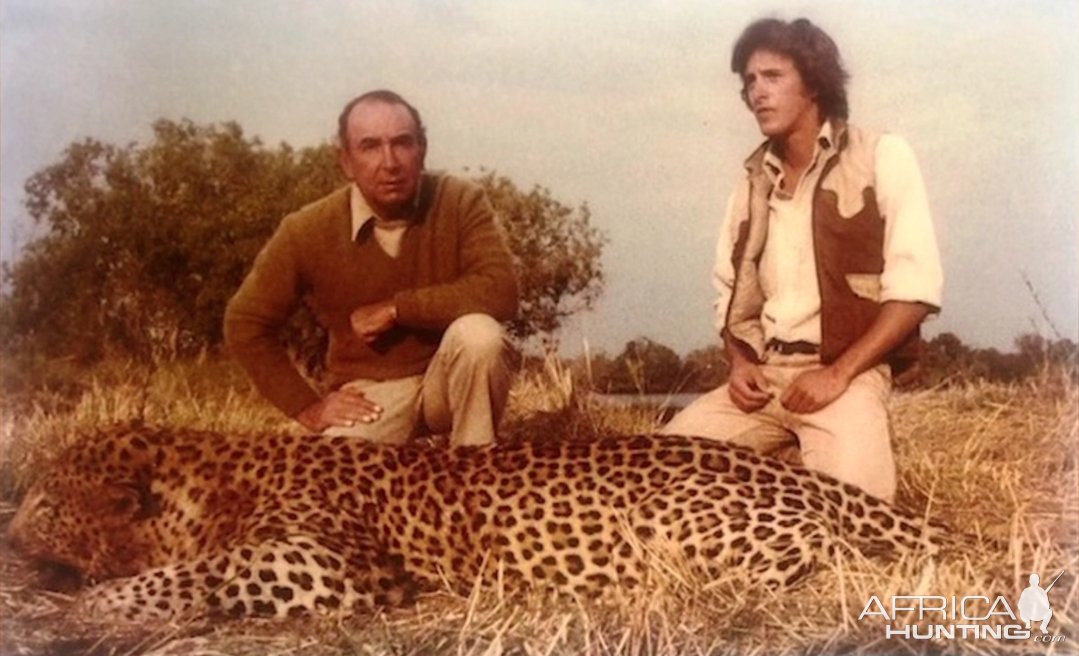 Jeff Rann with a huge leopard-Okavango Delta, Botswana