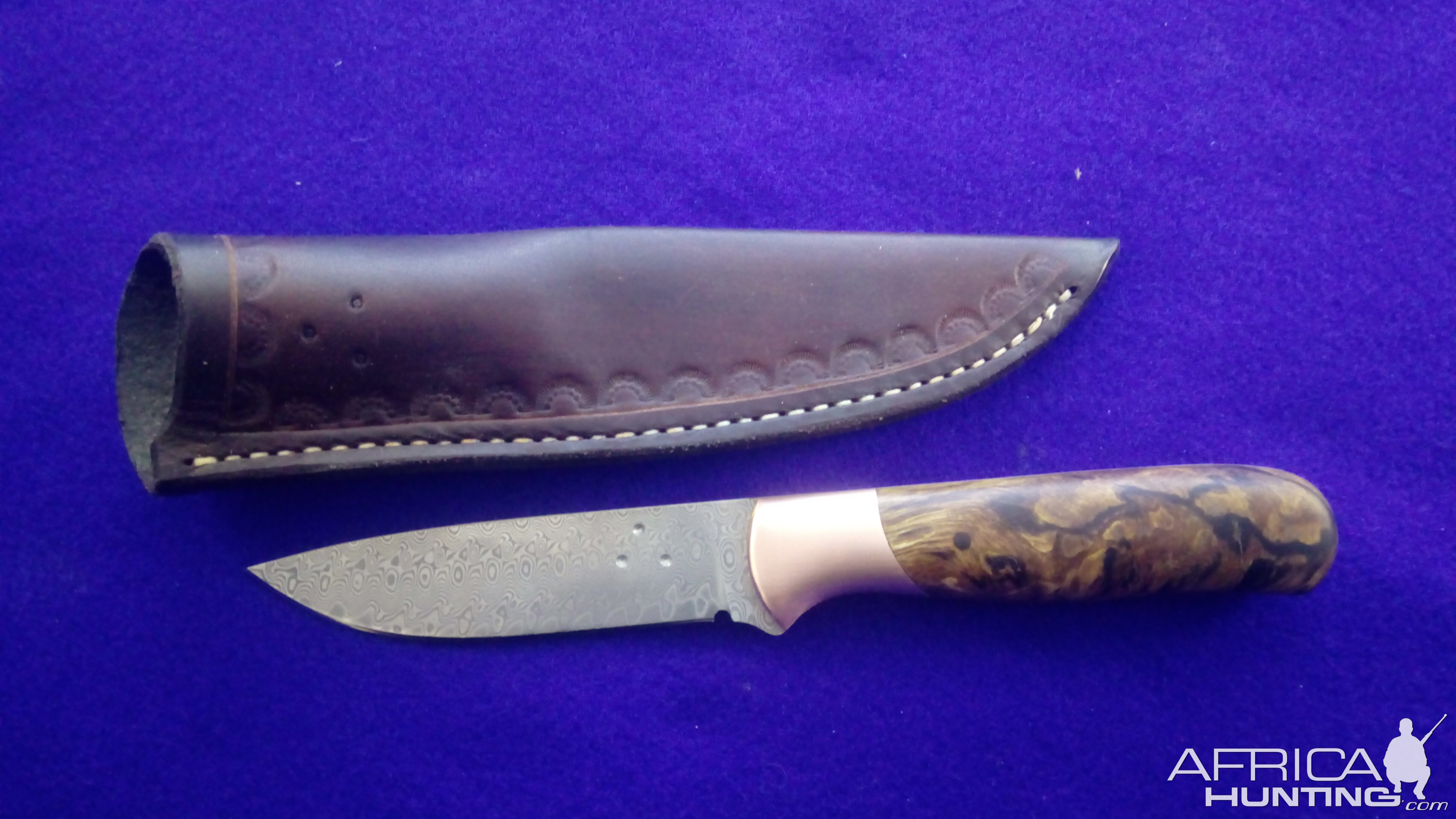 Knife with Raindrop stainless damascus blade and Stabilised Spalted Eucalyptus