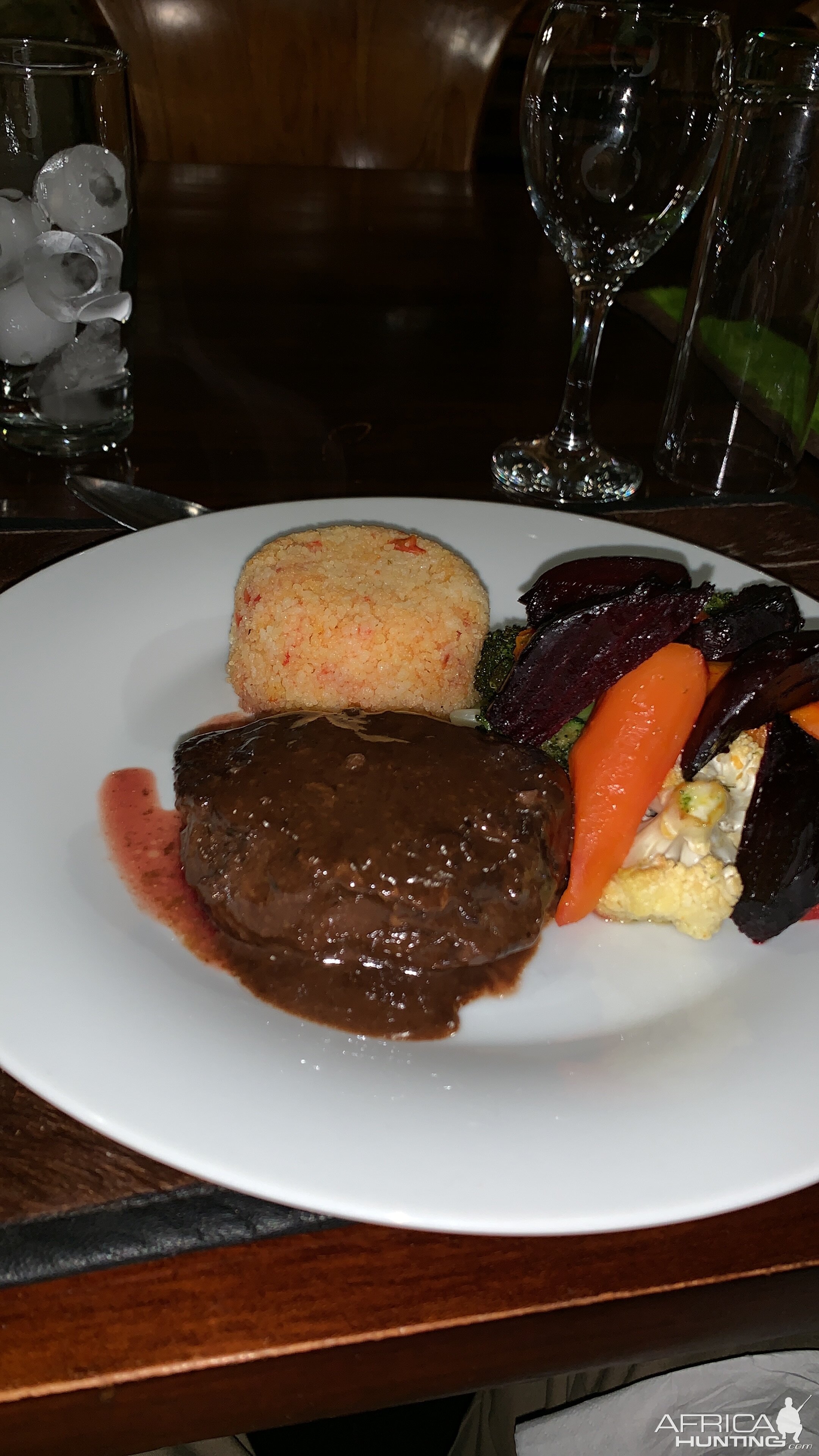 Kudu steak au jus, couscous, sautéed vegetables