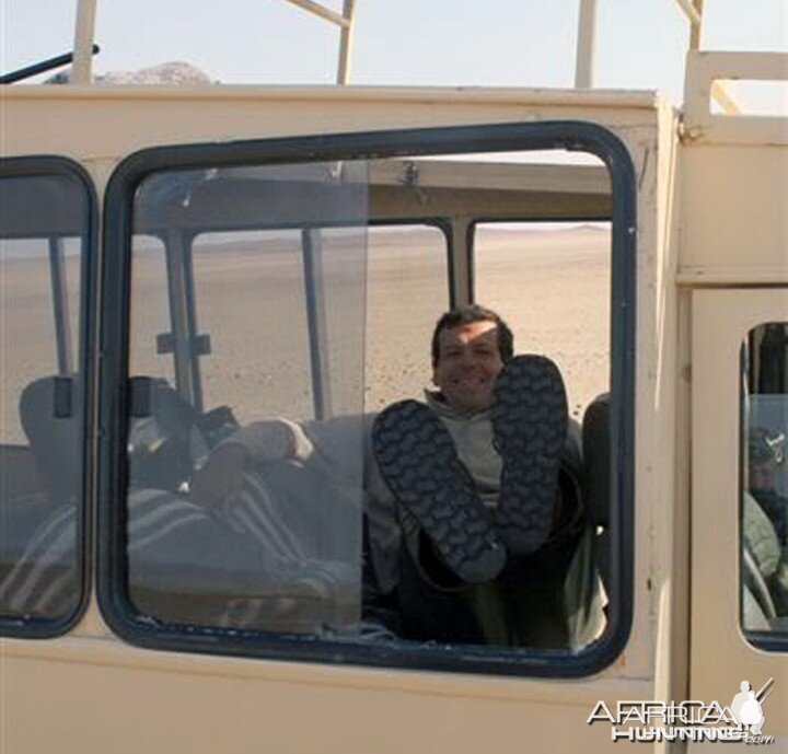 Lion Attack - Vehicle's broken out window from the Lion's charge