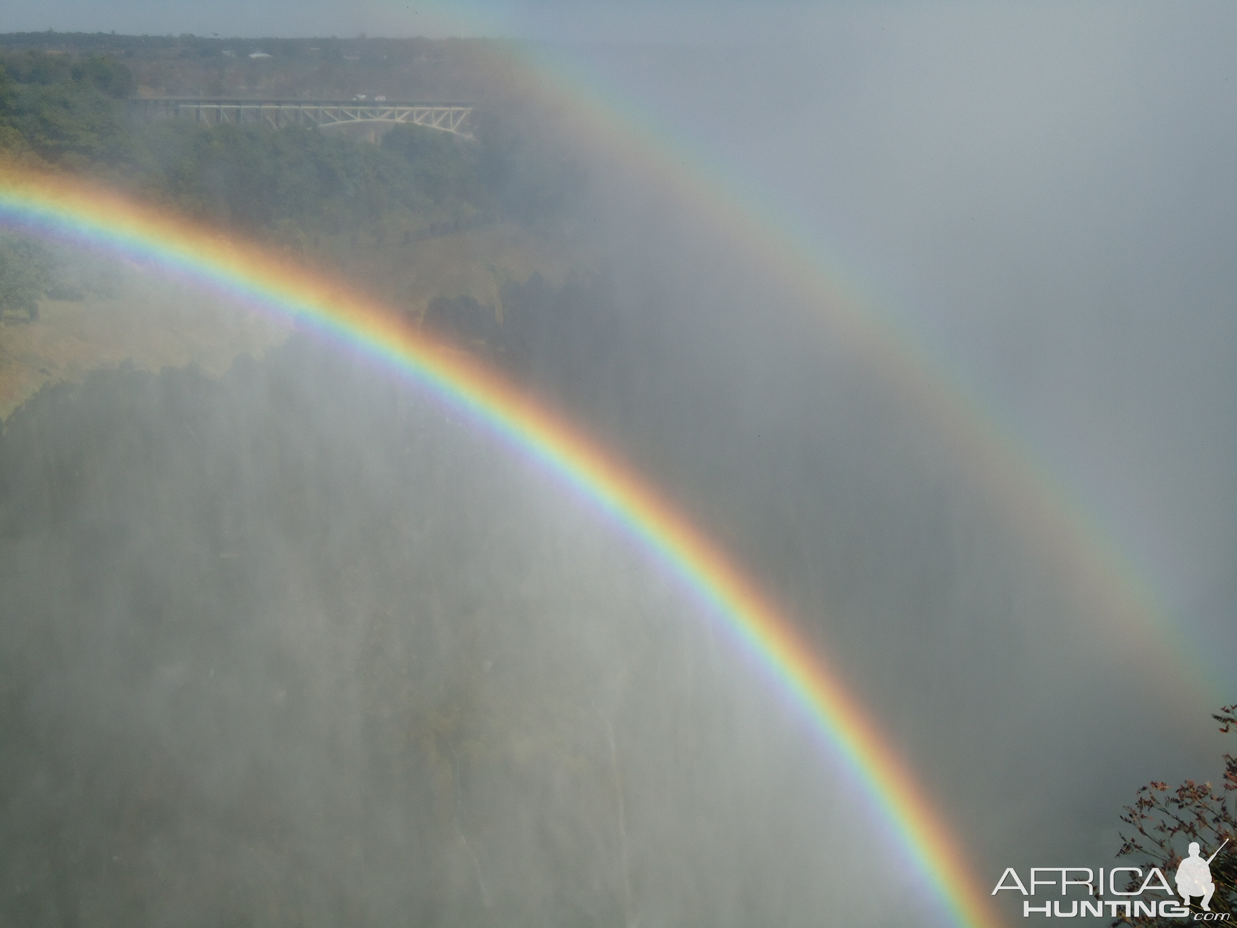 Rainbow in water shower from falls