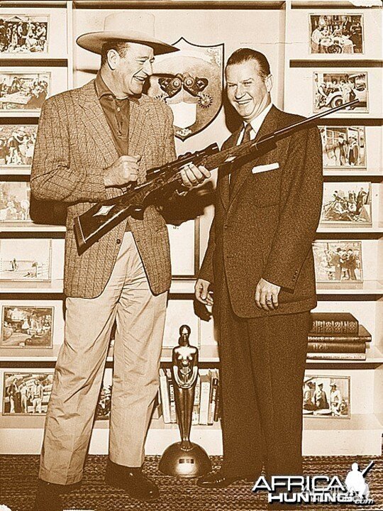 Roy Weatherby delivering John wayne his custom .300 WM