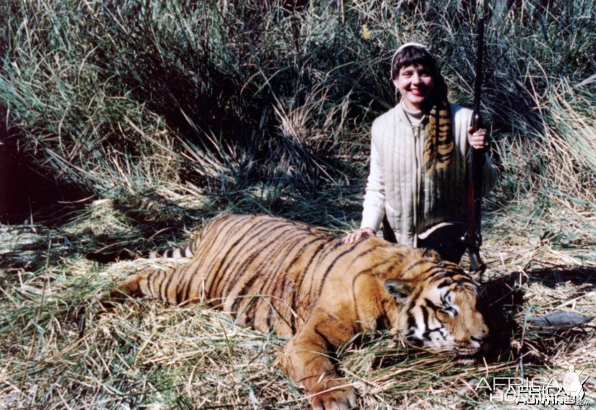 Zoe Dell with Tiger in India